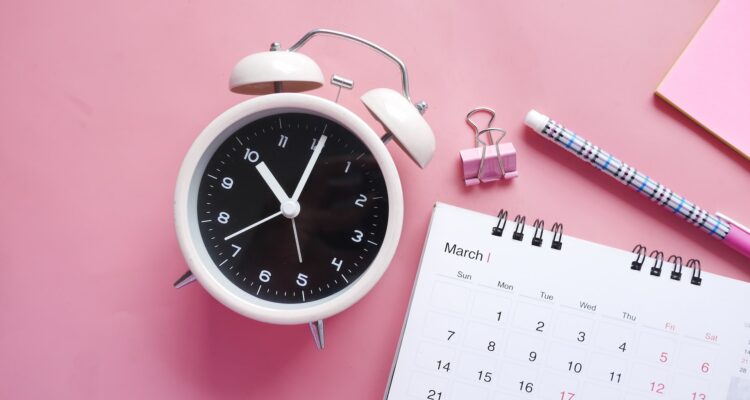 alarm clock pink background