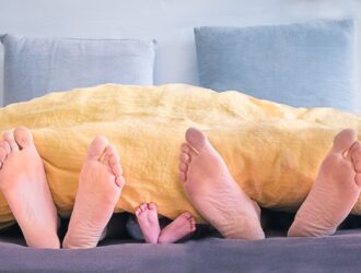 Feet hanging off the bed